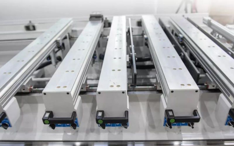 Working table with 8 rails, digital positioning indicators, and SCHMALZ vacuum blocks